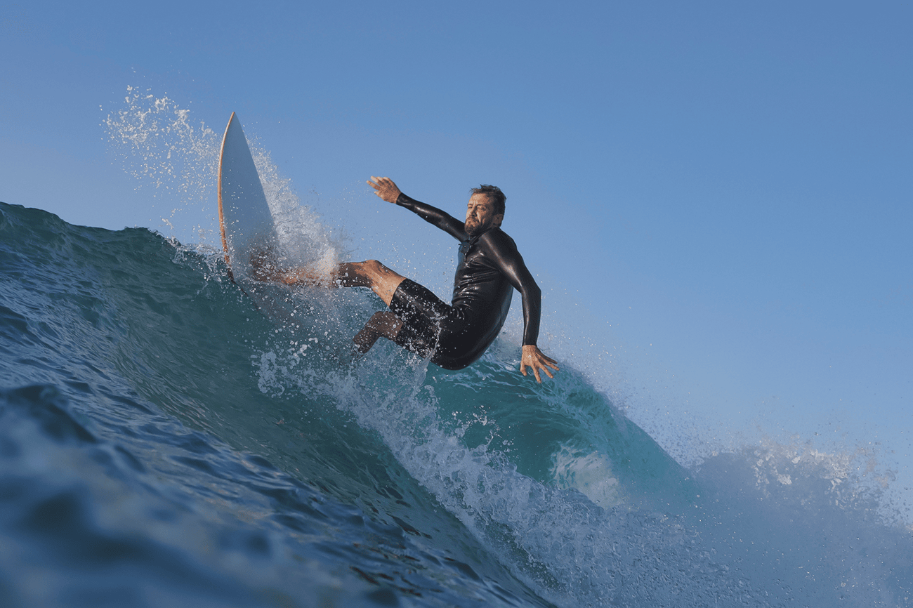 Surfer catching a wave