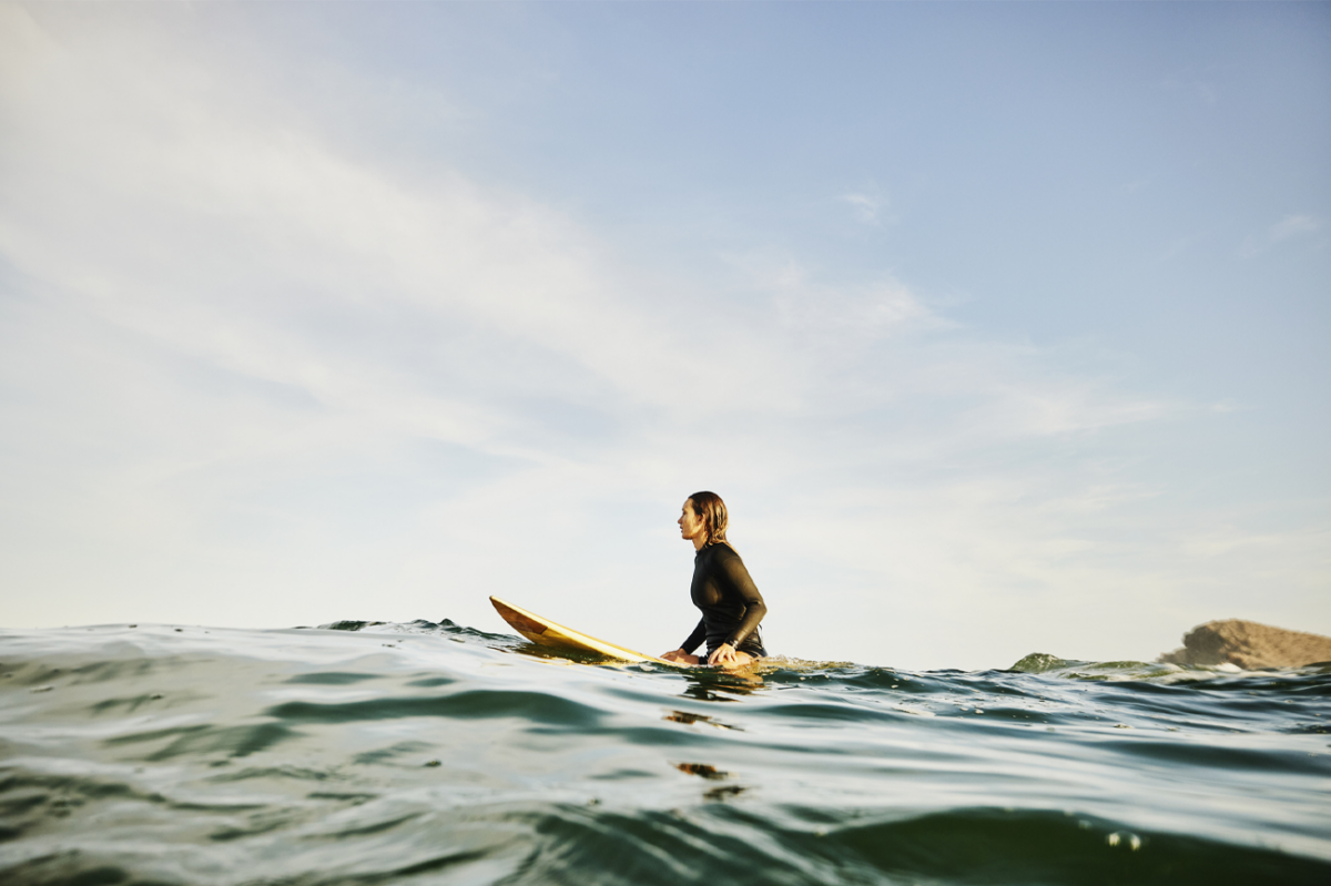 woman surfing
